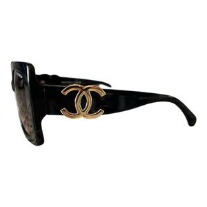 CHANEL Elegant Black Sunglasses with Gold Logo